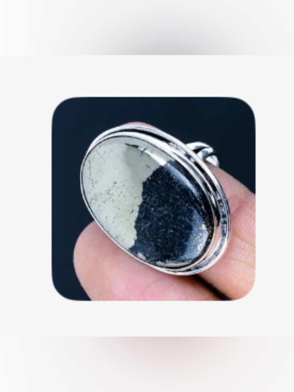 1 1/4 inch, Pyrite Agate ,925 marked ring size 8.